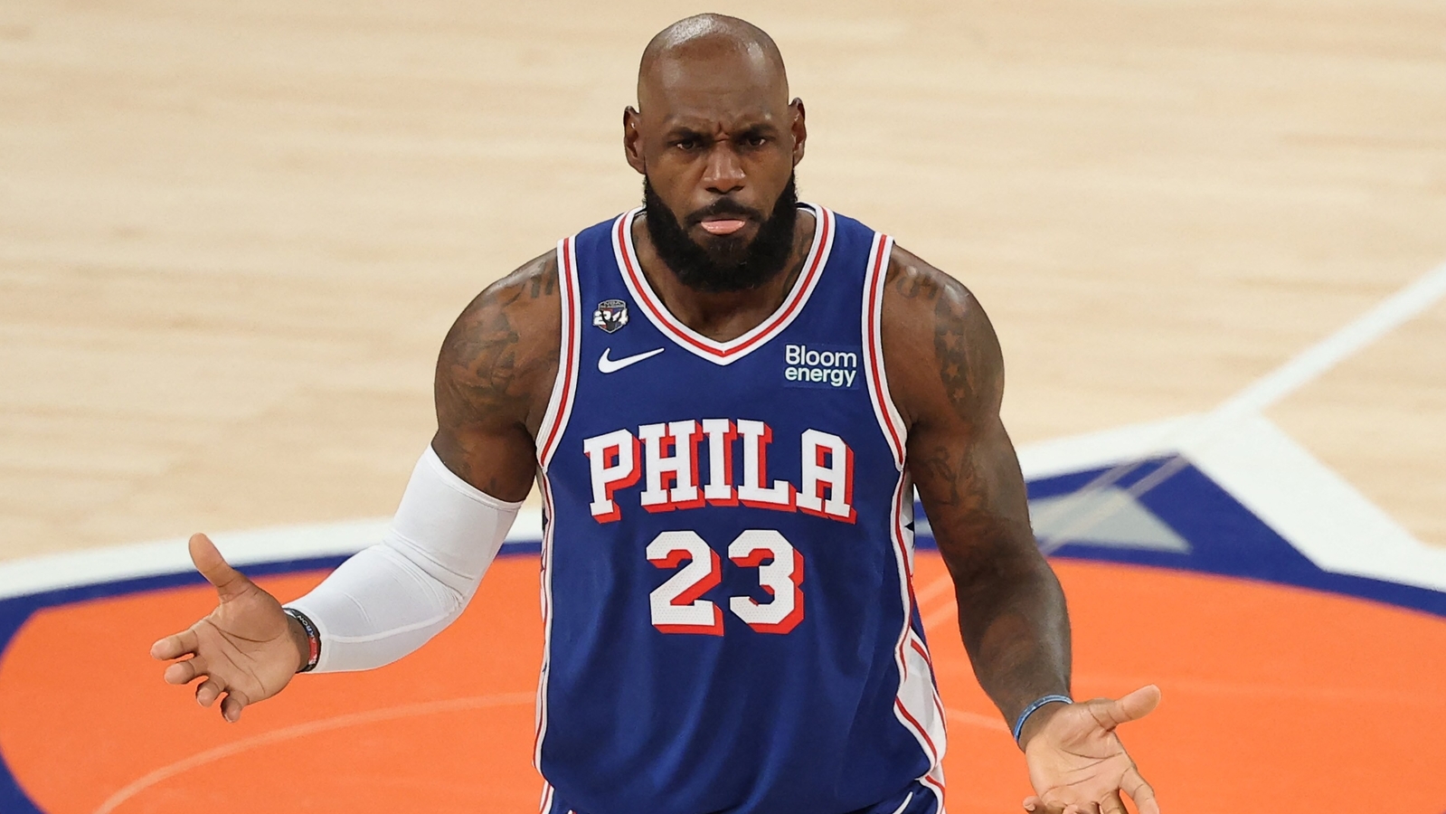 LeBron James' courtside exchange with fan draws attention during 76ers vs Knicks clash